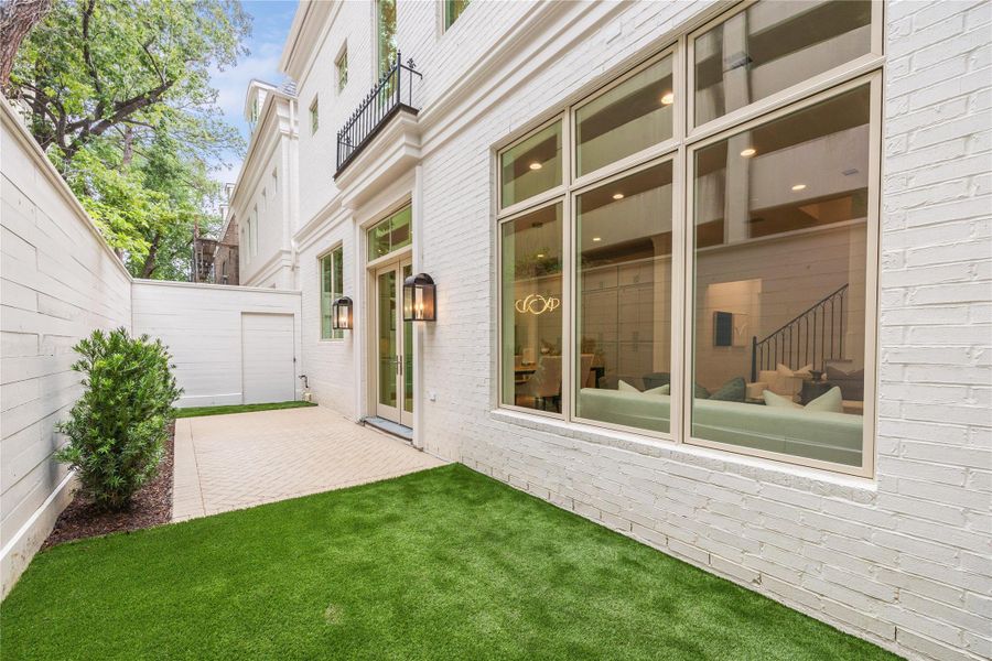 The residence features a slab-on grade foundation, a comprehensive framing and truss plan that meets all relevant codes and windstorm requirements, as well as borate termite treatment. Additionally, it features CertainTeed Landmark Series shingle composition roof, 6" half-round gutters with round downspouts, and Pella Lifestyle Series exceptionally energy-efficient E-rated windows. *Photo is of another home in the community and for informational purposes only.