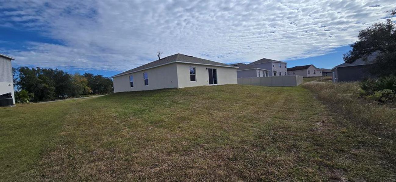 Exterior details and patio area of a home in Poinciana, Poinciana (Image 3).