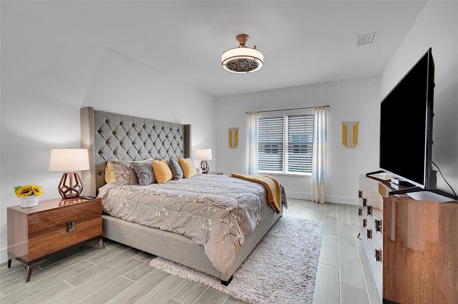 Very spacious primary bedroom is upstairs.