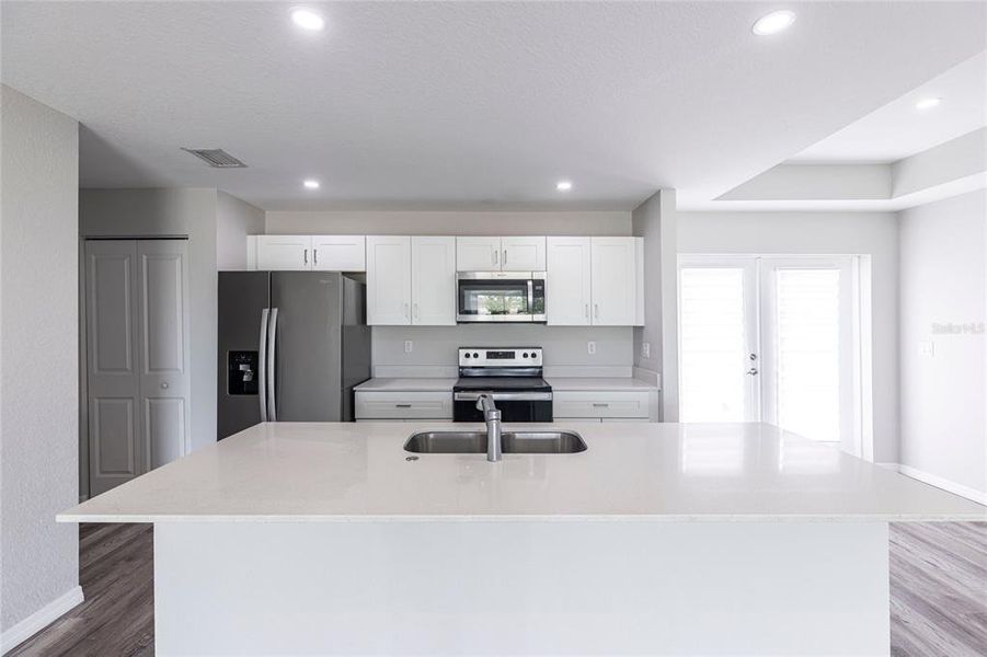 Furnished interior view inside a new home in , Cape Coral (Image 3). Furnished interior view inside a new home in , Cape Coral (Image 3).