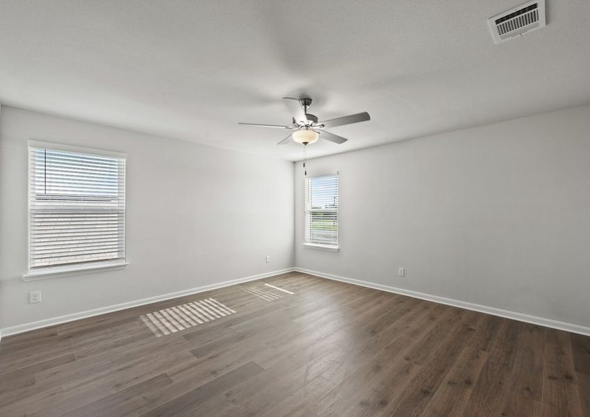 The master bedroom has large windows that let in great, natural light. The master bedroom has large windows that let in great, natural light.