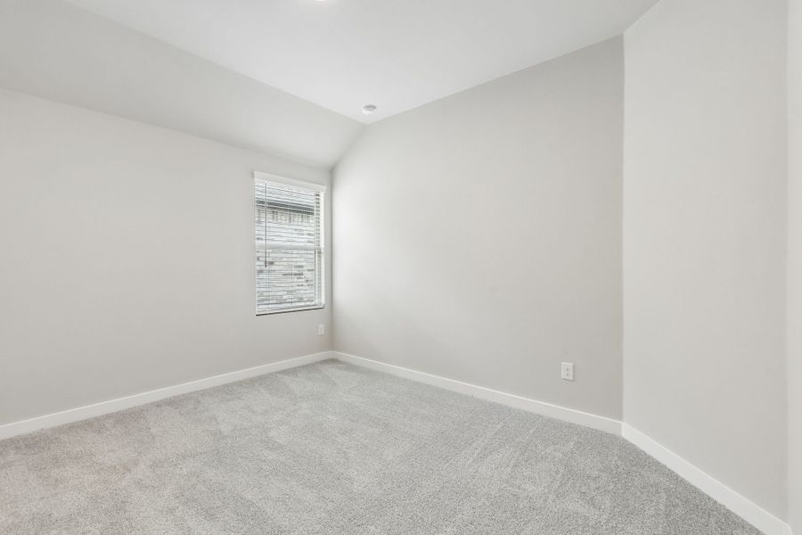 Bedroom in the Winters home plan by Trophy Signature Homes – REPRESENTATIVE PHOTO