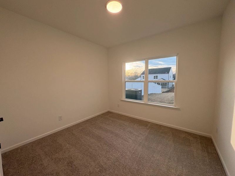 Primary Bed - A sophisticated retreat with style.