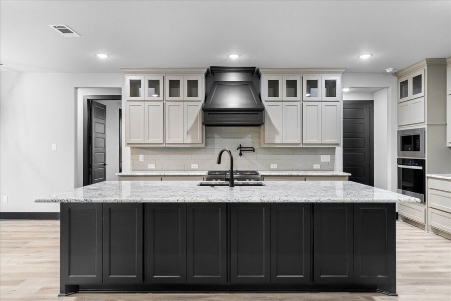 Representative furnished interior of a home built from the The Harper II by Doug Parr Custom Homes in Monarch Manor, Poolville (Image 4).