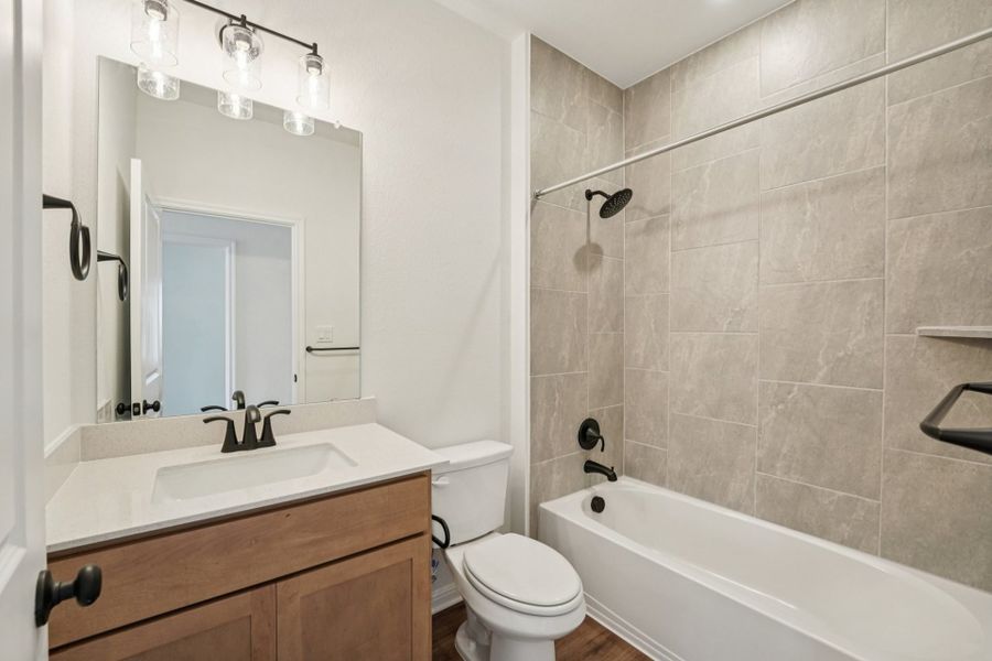 Furnished interior view inside a new home in Crosswinds, Kyle (Image 8).