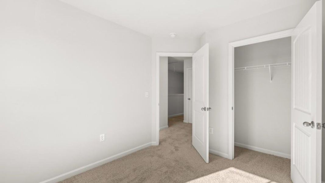 Spacious, unfurnished interior of a new home in Waypoint, Flowery Branch (Image 18).