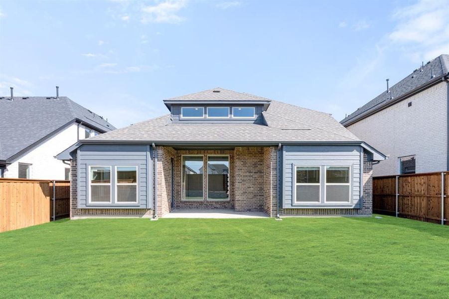 Exterior details and patio area of a home in Creekview Meadows, Pilot Point (Image 26).