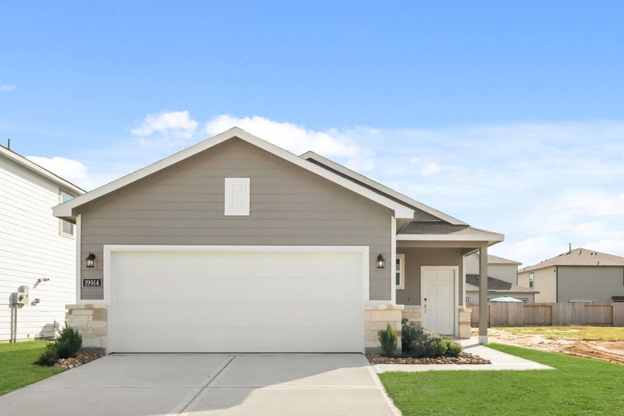 Front exterior of a new home in Northpark South, Porter, TX, highlighting curb appeal (Image 1). Front exterior of a new home in Northpark South, Porter, TX, highlighting curb appeal (Image 1).