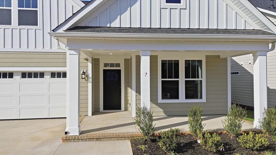 Notable street presence with tasteful elevation and thoughtful landscaping located at the Pelham Crossing community