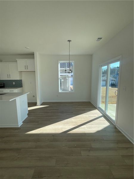 Spacious, unfurnished interior of a new home in Springwood Grove, Central (Image 31).