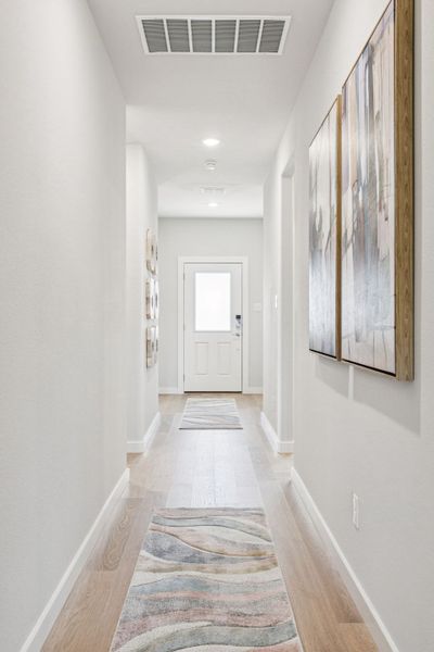 Entryway in the Oscar home plan by Trophy Signature Homes – REPRESENTATIVE PHOTO