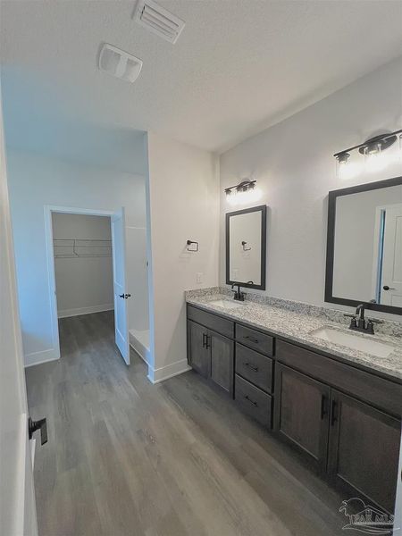 Furnished interior view inside a new home in Pine Top, Cantonment (Image 6).