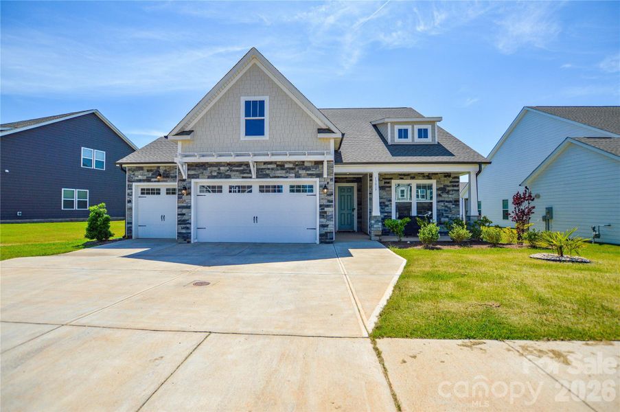Front exterior of a new home in Edgewater Lakeview On Your Lot, Lancaster, SC, highlighting curb appeal (Image 21).