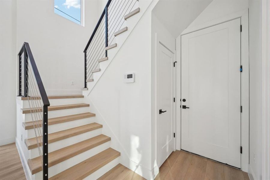 Entryway with light hardwood / wood-style flooring