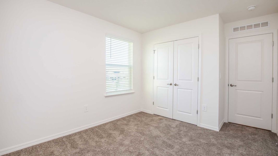 Representative unfurnished interior of a home built from the Glendale by Maronda Homes in Crosswinds, Haines City (Image 11).