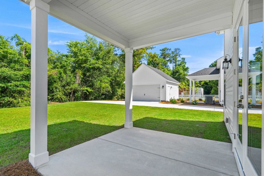 Exterior details and patio area of a home in Downtown Loris Homes, Loris (Image 4).