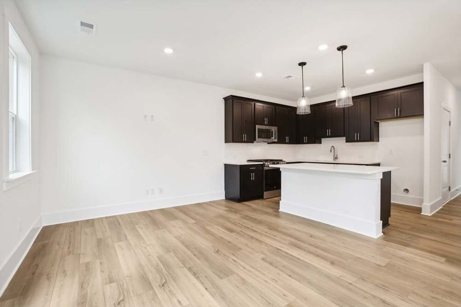 Kitchen Featuring Industrial Collection Finishes