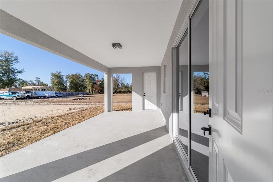 Exterior details and patio area of a home in , Ocala (Image 4).