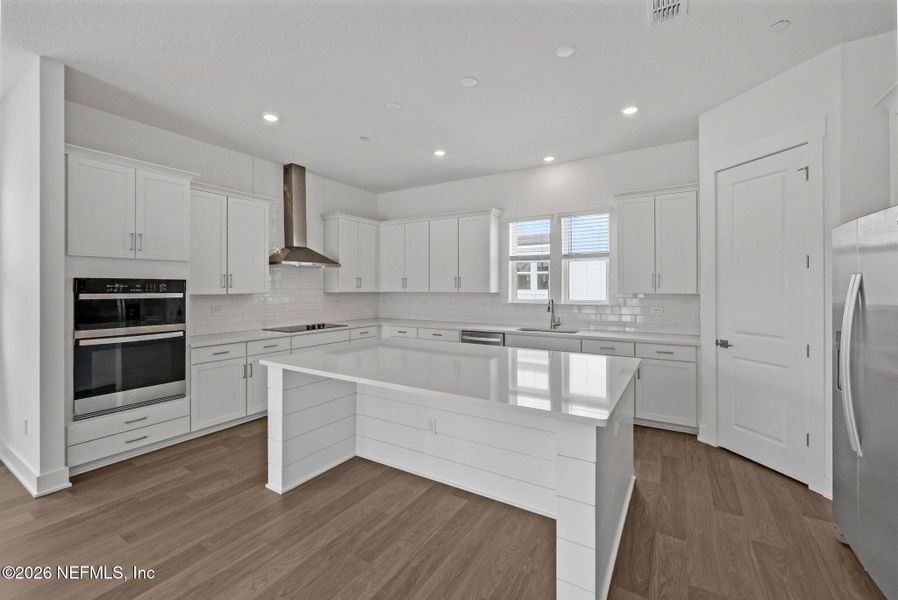 Furnished interior view inside a new home in North Beach Townhomes, Jacksonville Beach (Image 6).