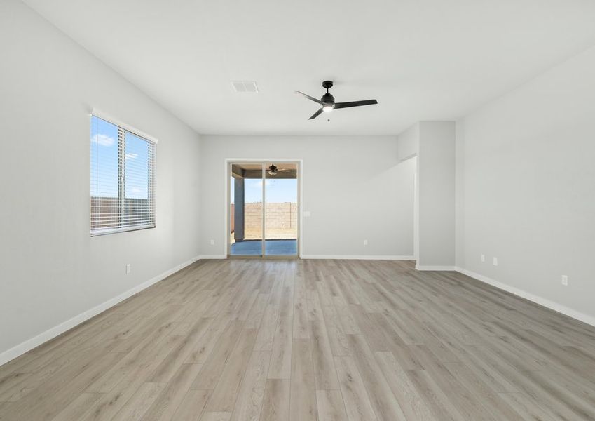 Sliding glass doors welcome you to your own private backyard.