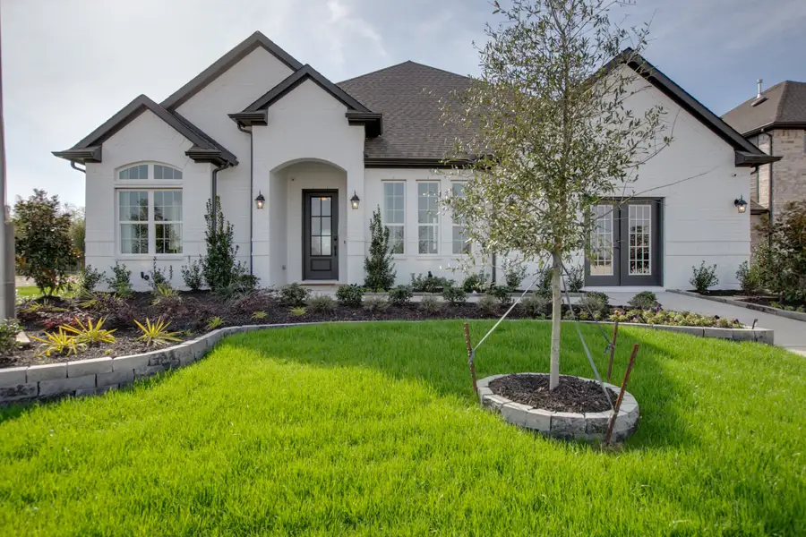 Representative exterior photo of a completed home built from the Bellaire by Sandlin Homes in Lakesong, Midlothian, TX (Image 2). Representative exterior photo of a completed home built from the Bellaire by Sandlin Homes in Lakesong, Midlothian, TX (Image 2).
