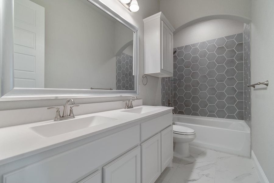 Bathroom | Concept 3634 at Hidden Creek Estates in Van Alstyne, TX by Landsea Homes