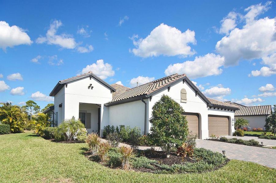 Front exterior of a new home in , Englewood, FL, highlighting curb appeal (Image 23).