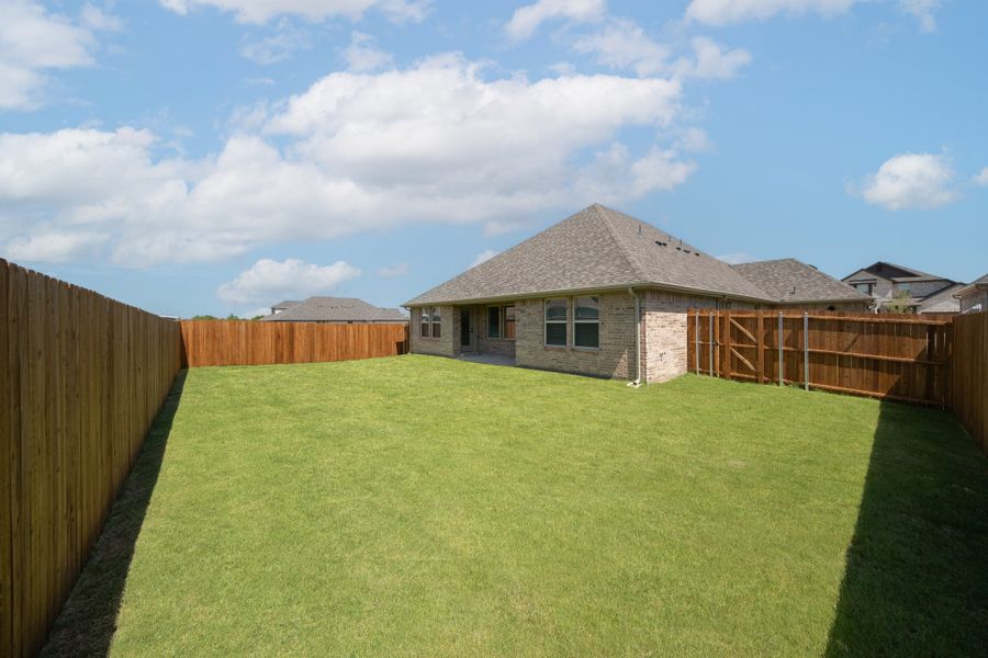 Exterior details and patio area of a home in Verandah, Royse City (Image 3).