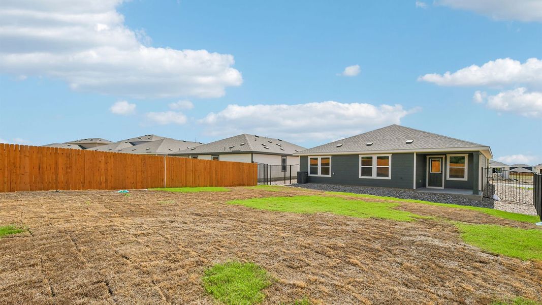 Exterior details and patio area of a home in Trails at Wildhorse, Austin (Image 20).