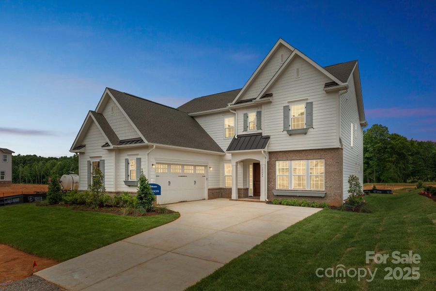 Front exterior of a new home in Coventry Glen, Huntersville, NC, highlighting curb appeal (Image 2).