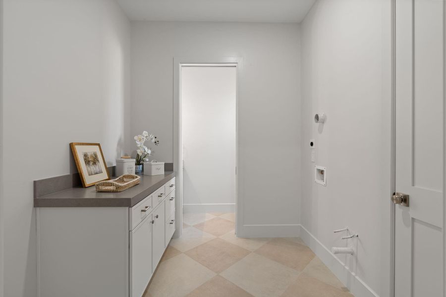 second refrigerator/ second laundry/utilty sink all downstairs