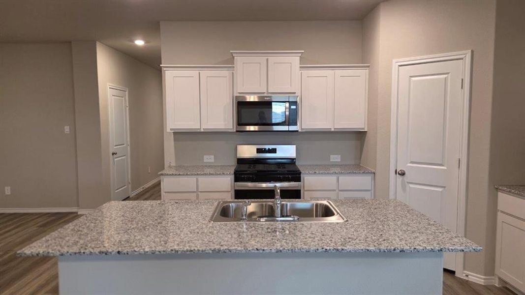 Kitchen- All Home and community information, including pricing, included features, terms, availability and amenities, are subject to change at any time without notice or obligation. All Drawings, pictures, photographs, video, square footages, floor plans, elevations, features, colors and sizes are approximate for illustration purposes only and will vary from the homes as built.