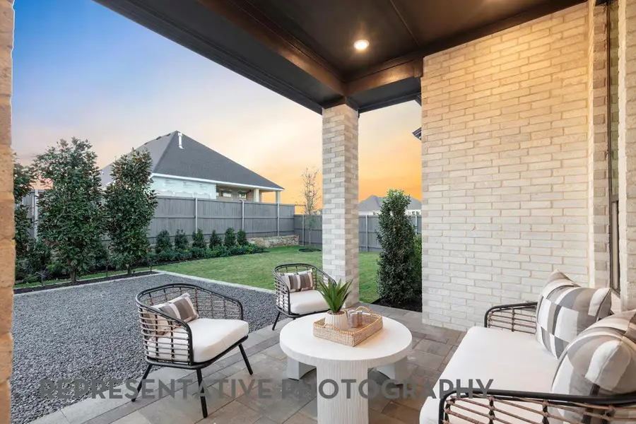 Exterior details and patio area of a home in Flora, Hutto (Image 2).