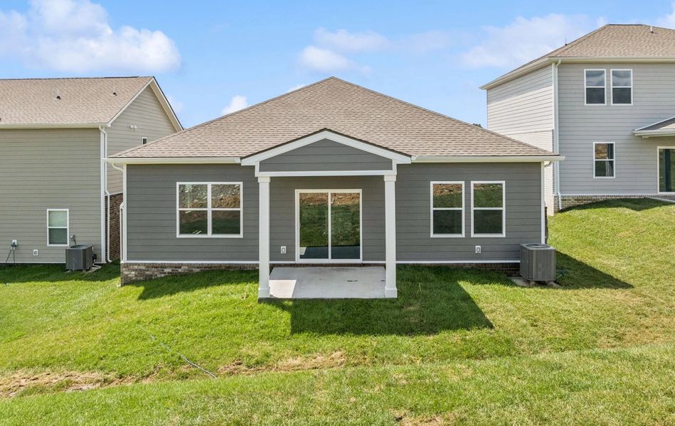 Front exterior of a new home in Cades Bluff, Lebanon, TN, highlighting curb appeal (Image 19).