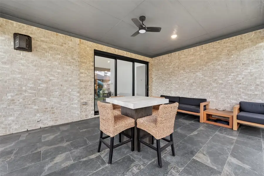Exterior details and patio area of a home in Avalon at Cypress, Cypress (Image 4).