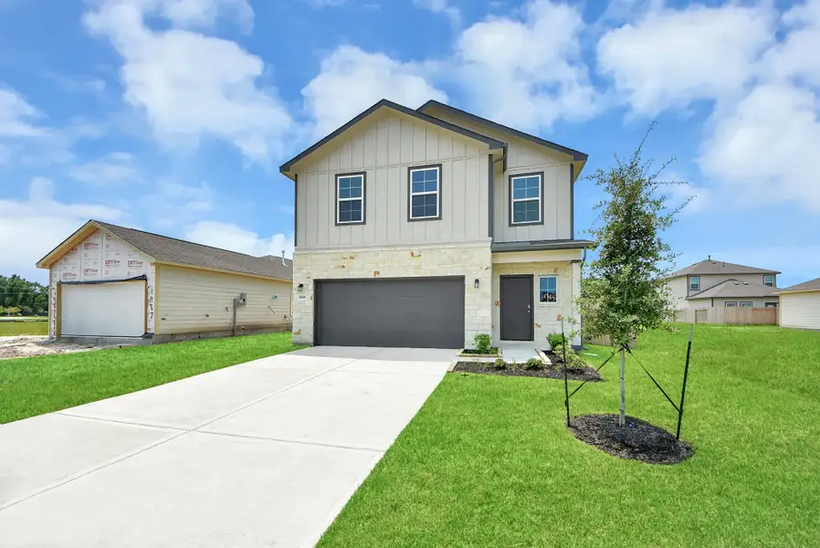 Front exterior of a new home in The Villages at WestPointe, Dayton, TX, highlighting curb appeal (Image 26).