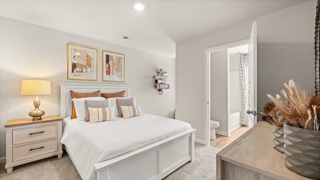 Representative furnished interior of a home built from the Stratford by D.R. Horton in Echo Glen, Stockbridge (Image 24).