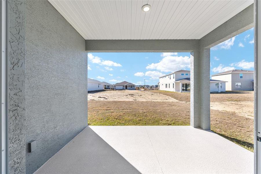 Exterior details and patio area of a home in Calesa Township, Ocala (Image 25).