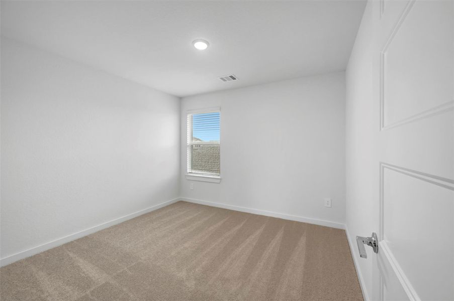 Spacious, unfurnished interior of a new home in Wildrye, Waller (Image 24).