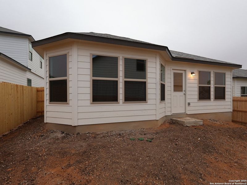 Exterior details and patio area of a home in Paloma Park, Converse (Image 3).