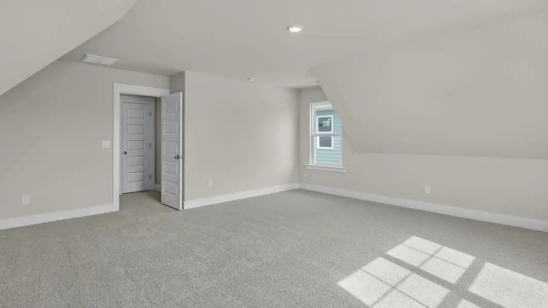 Representative unfurnished interior of a home built from the Forrester by D.R. Horton in The Highlands at Cedar Hill Landing, Navassa (Image 37).
