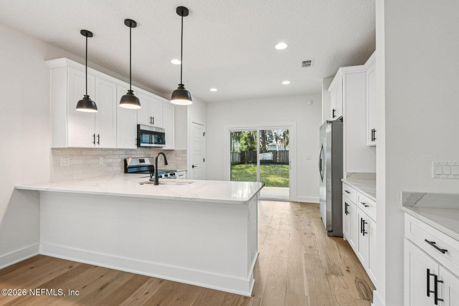 Furnished interior view inside a new home in , Green Cove Springs (Image 15).