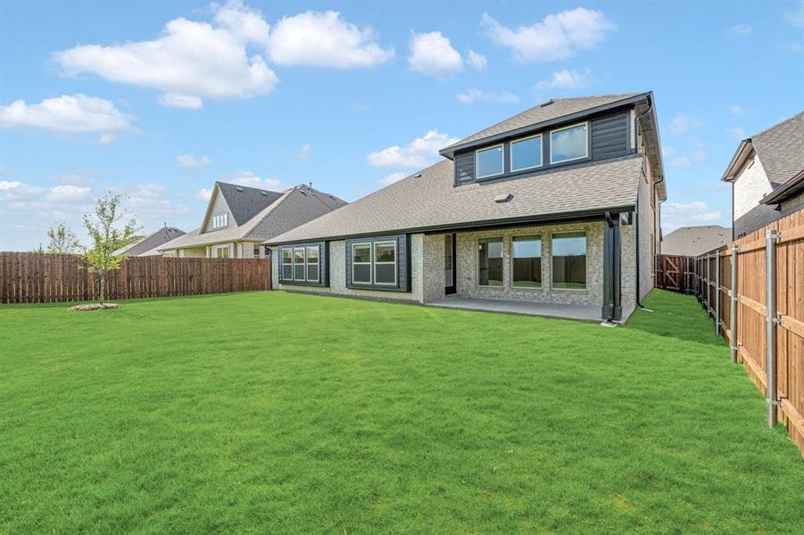 Exterior details and patio area of a home in Wildflower Ranch 60-65, Justin (Image 3). Exterior details and patio area of a home in Wildflower Ranch 60-65, Justin (Image 3).