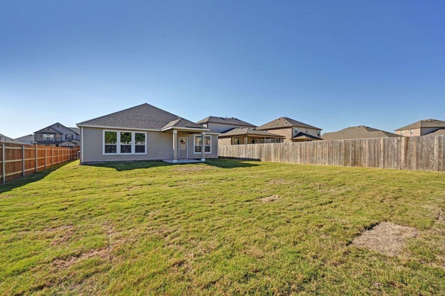 Exterior details and patio area of a home in Salerno - Classic Collection, Round Rock (Image 3).