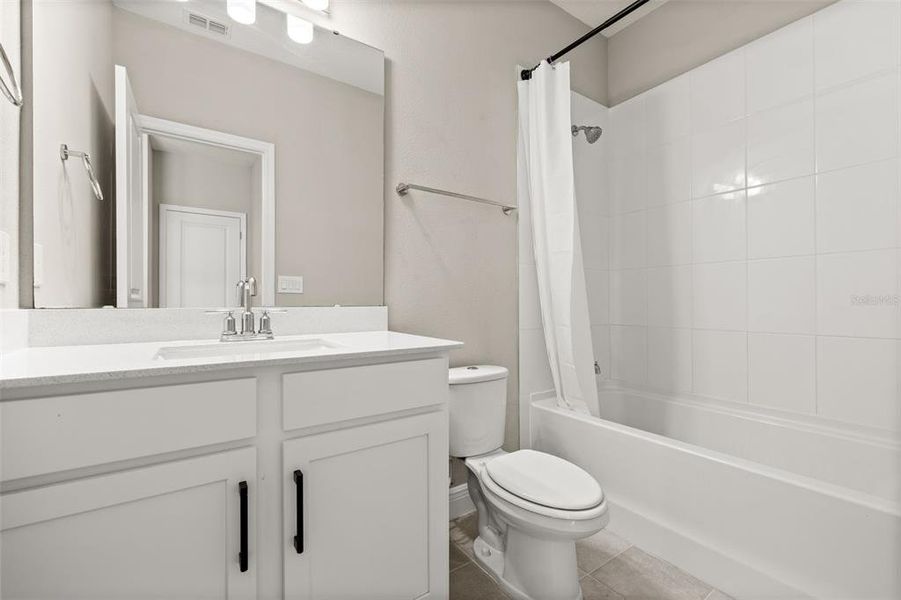 Furnished interior view inside a new home in Highland Ridge, Winter Garden (Image 42).