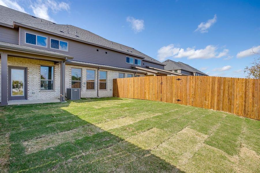 Exterior details and patio area of a home in , Mansfield (Image 25).