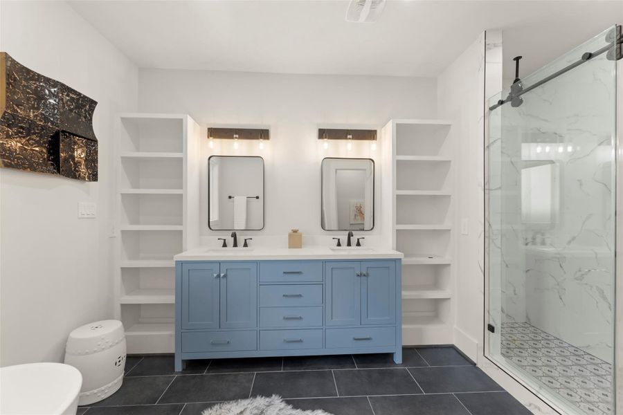 Double sinks with custom built in shelves!