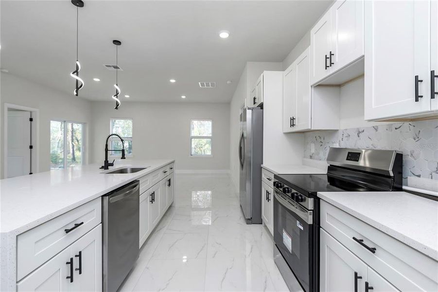 Furnished interior view inside a new home in , Ocala (Image 8).
