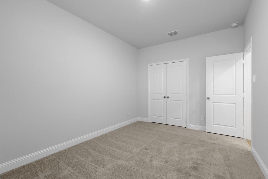 Representative unfurnished interior of a home built from the Garrison I by Cheldan Homes in Stoneview, Glen Rose (Image 40).