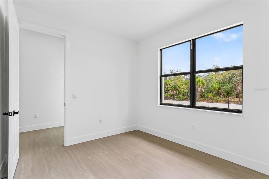 Spacious, unfurnished interior of a new home in , Port Charlotte (Image 20).